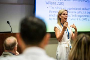 Bobbi Thomason giving presentation in lecture hall at Pepperdine