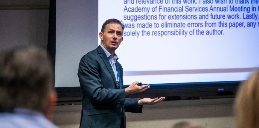 Dr. James DiLellio presenting at a conference