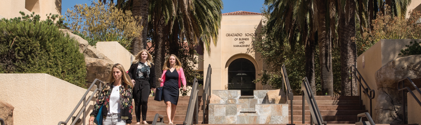 Students walking outside of the business school campus in Malibu
