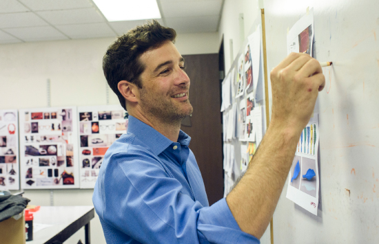 MBA joint degree pathway student at whiteboard